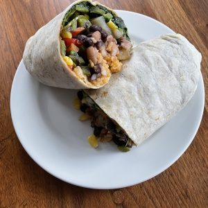 Taco Choza's hulking Burrito Vegetariano is loaded with a healthy collection of tasty veggies along with Mexican rice and two kinds of beans.