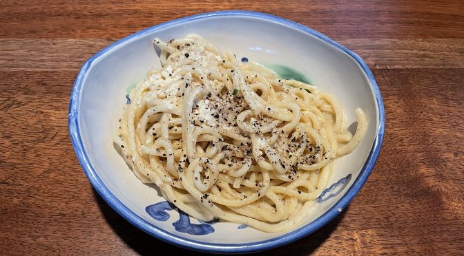 Cacio e pepe, a classic Roman pasta dish, is elevated with hand-made Tuscan pici pasta, pecorino, and smoked black pepper from Bourbon Barrel Foods. (Partial serving, plated at home.)