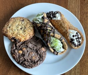 All this goodness for just $6! Legacy Pizza's sweets sampler offers two cannoli and two oversize cookies.