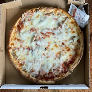 Yes, this really is a mushroom pizza from Sal's. The 'shrooms and the spicy tomato sauce are well hidden under a thick, comfy blanket of stretchy mozzarella.