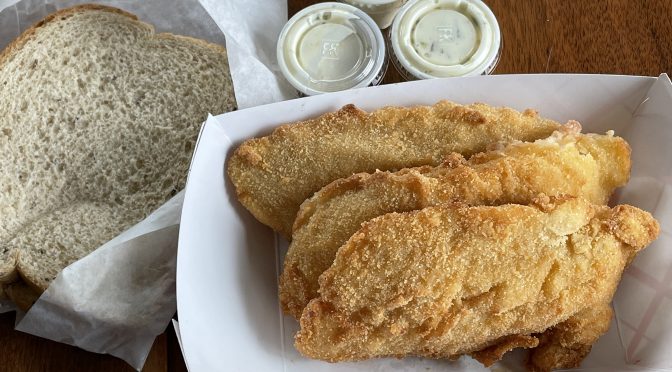 The Fishery's fried Icelandic cod platter features a generous portion of three fillets and two sides.