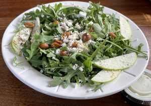 Hog Father's arugula salad is a real winner, thoughtfully imagined and carefully prepared.