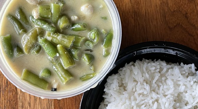 Simply Thai's green curry is just as green as the name implies, filling a gentle greenish broth with fresh green beans.  