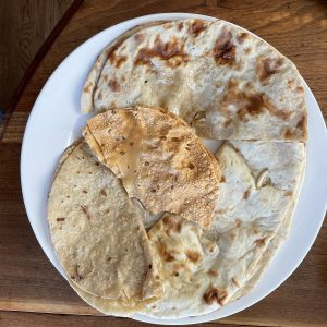 Tikka House is known for its fresh Indian breads. We loaded up with naan, pappadum, chapati and roti.