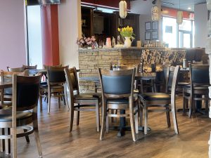 Jasmine's tables appear closely spaced, but staff set diners apart