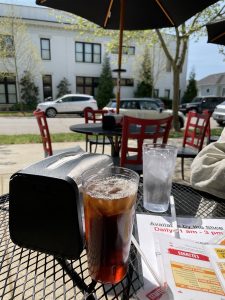 It's not quite Flatbush, but Old School NY's corner patio offers a mix of sun and shade for the season's warming days.