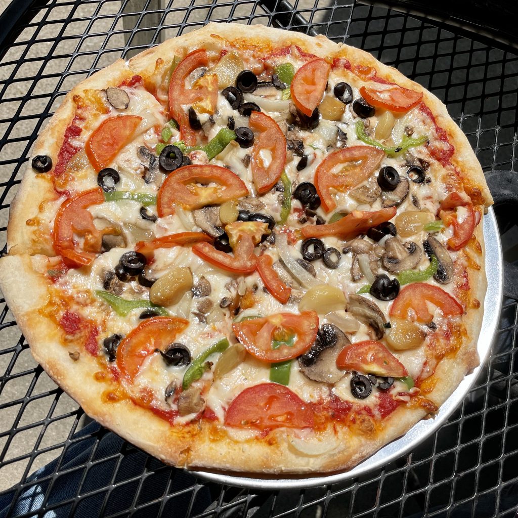 The small pizzas at Old School NY measure 12 inches; that's plenty for two with this delicious, thin-crust veggie pie.