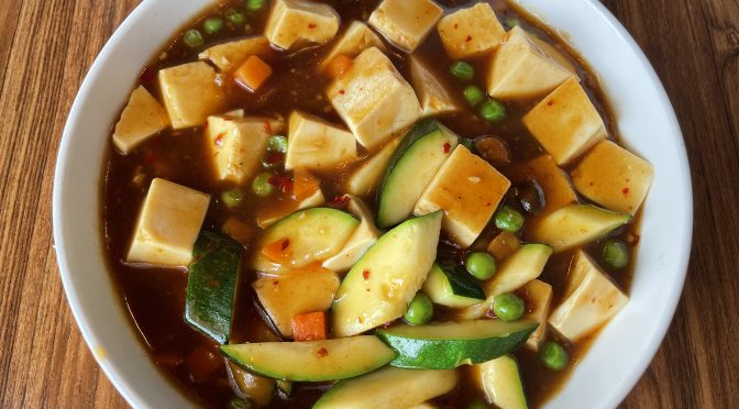 Joy Luck's kung pao tofu is a simple mix of tofu and veggies in a fiery brown-bean sauce.