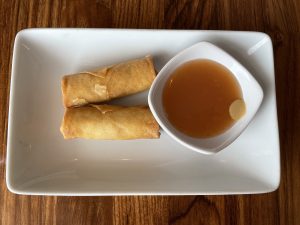Spring rolls are crisply fried and sizzling hot.