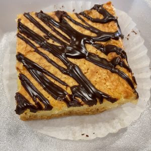 Chess pie, known for its sweet simplicity, makes an excellent chocolate-drizzled bar.