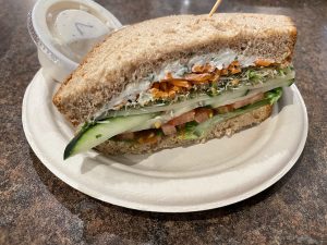 The memorable Mid City Underground sandwich is a tantalizing mix of crunchy, soft, and chewy veggies, Jarlsberg cheese, scallion cream cheese, and lemon-dill mayo on thick wheat bread.