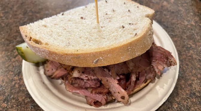 The Woody Allen is a classic New York deli sandwich, peppery beef pastrami on rye bread, both made in-house.