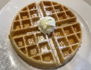 Thick, crisp, and fresh from the griddle, with maple syrup and butter, Wild Eggs' Belgian waffle is a delight.