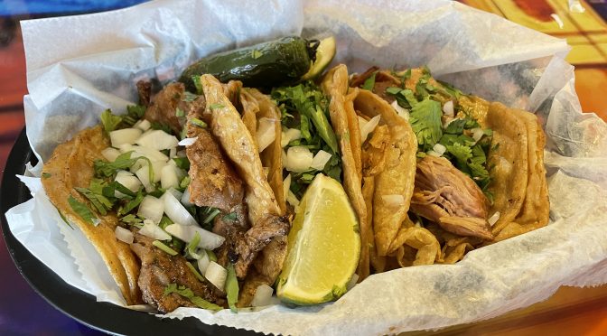 Three hearty tacos! El Mariachi seems to grill the corn tortillas in oil before forming the tacos, which imparts a deliciously greasy, weighty character.