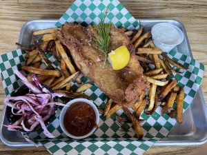 Pints & Union's fish and chips features deliciously flaky, perfectly breded fish as good as you'd find at a London pub.