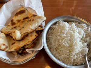 Browned in spots from the fiery tandoori oven, puffy, light naan is a must-have side item for an Indian meal.