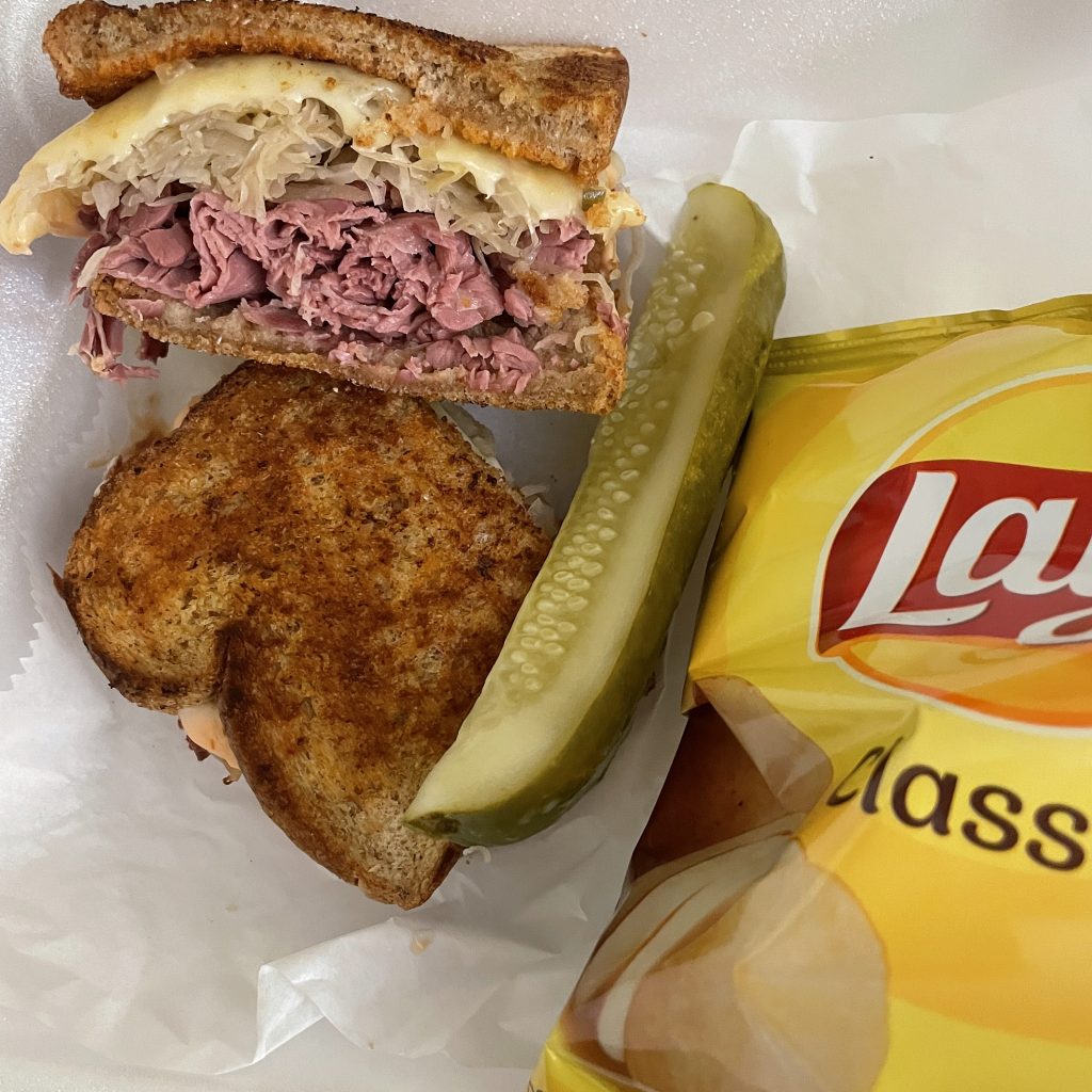 The Ruben (Starving Artist's art-influenced take on the classic Reuben) is a crisp and enticing baked corned-beef and sauerkraut treat.