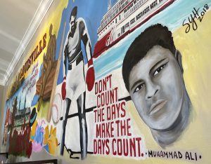 Colorful murals highlight our city and Muhammad Ali, one of our favorite sons.