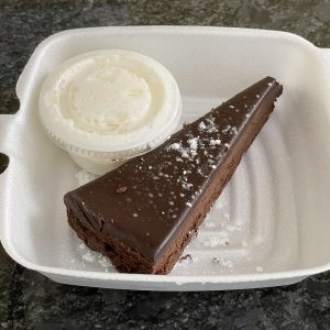 A to-go slice of chocolate torte, the dessert of the day, boasted deep and complex chocolate flavors. Two thumbs up!