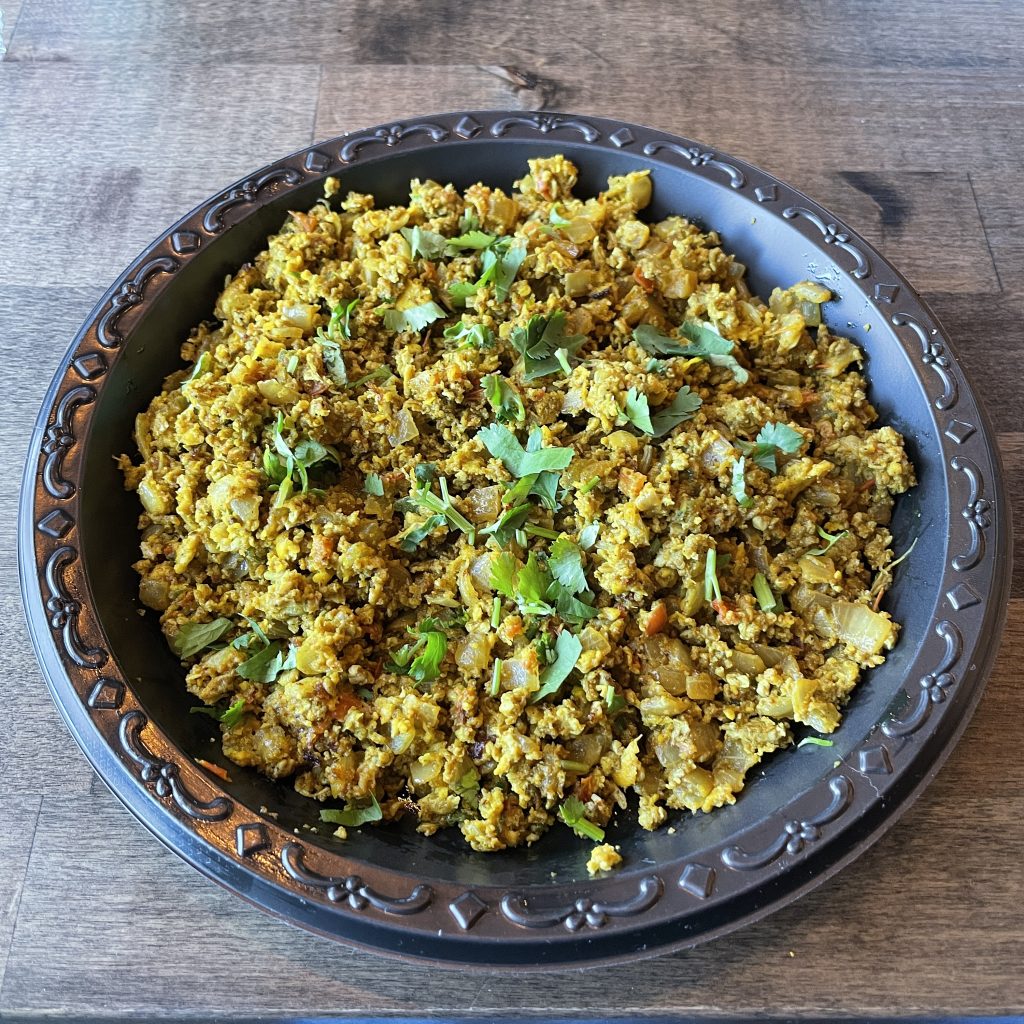Ordered mild, egg bhurji still hits your palate with a pleasant warming note. It's Gujarati-style eggs mixed with mild spices and veggies chopped as fine as grains of rice.