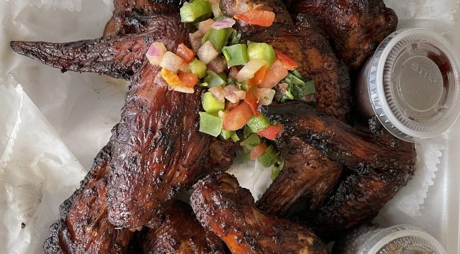 Meaty, oversize wings are AS charred and smoky as a four-alarm fire.