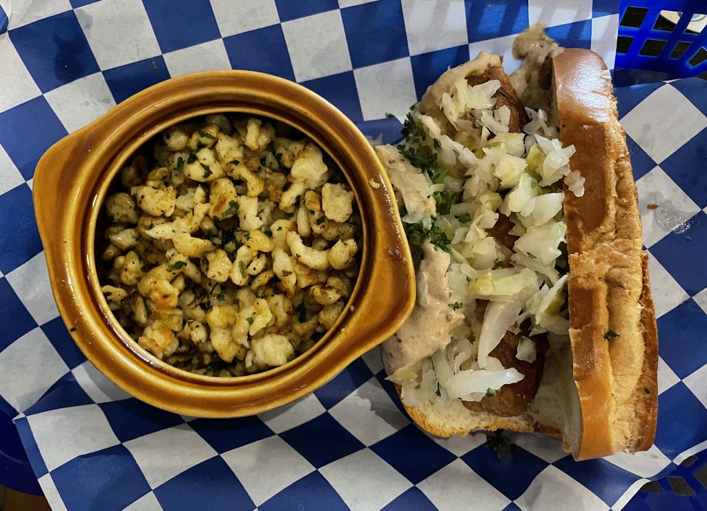 Like any good German-style restaurant, Common Haus offers a half-dozen different sausages. This vegan brat, served stadium-style on a good toasted roll, is loaded with kraut and mustard with spätzle on the side.