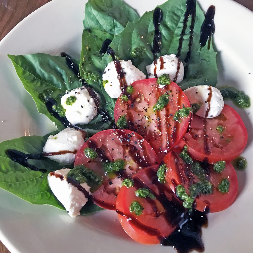 This was a beautiful, delicate caprese salad, made with fresh produce and tastefully assembled. Until the kitchen tried to improve it with splashes of strong balsamic and dots of pesto oil. Sometimes it's best to stick with tradition because it's good that way.