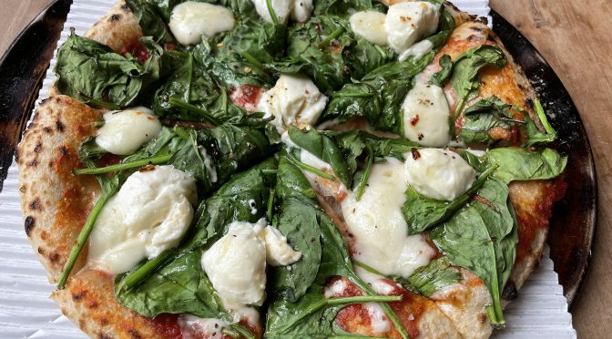 Built on outstanding fresh-milled grain crust and fired with pretty browned leopard spots, this 9-inch MozzaPi pizza is topped with fresh spinach, mozzarella and ricotta, and a spicy fresh tomato sauce.