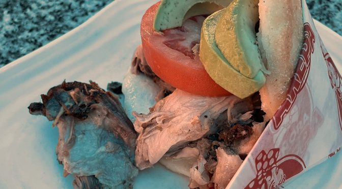 Blue summer skies and blue-tinted tables give Señora Arepa's shady patio a seaside feel, and haded our food photos with a bluish cast. Regardless of its apparent hue, the Caribbean-style pork in a pernil arepa is delicious, tender and juicy.