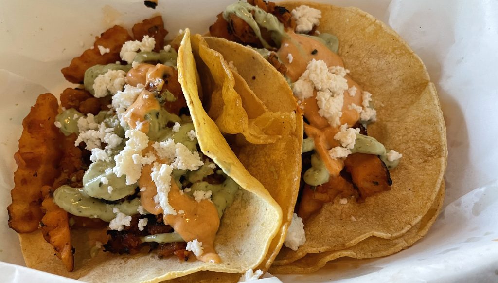 The soyrizo taco channels the idea of an Ensanada fish taco but with vegan chorizo and french fries rolled in crunchy fried tortillas.