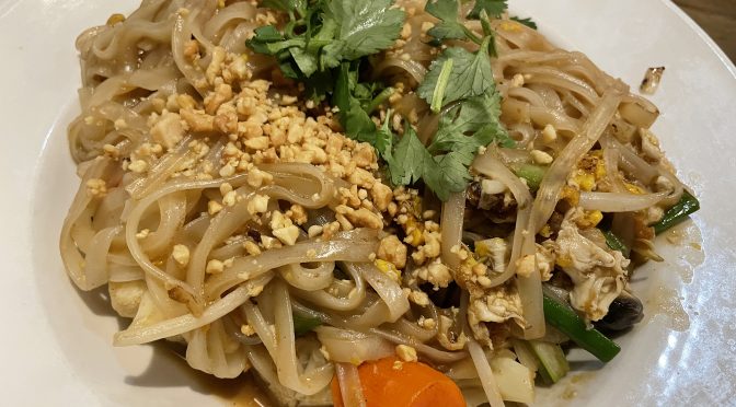 The vegetarian version of pagoda noodles – District 6's Vietnamese take on pad thai – brings a load of tender noodles, peanuts and scrambled egg on a bed of blanched veggies and fried tofu cubes.