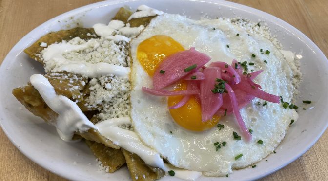 It usually takes me a couple of minutes to figure out how to eat chilaquiles, but I never regret ordering Con Huevos' version of this filling breakfast dish.