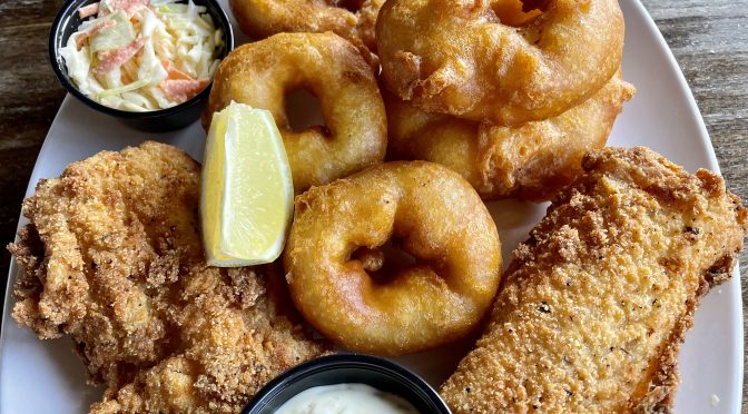 A worthy Lenten alternative, The Raven's fish and chips plate features two thick cod loins cloaked in shattering crisp breading; airy beer batter is also available.