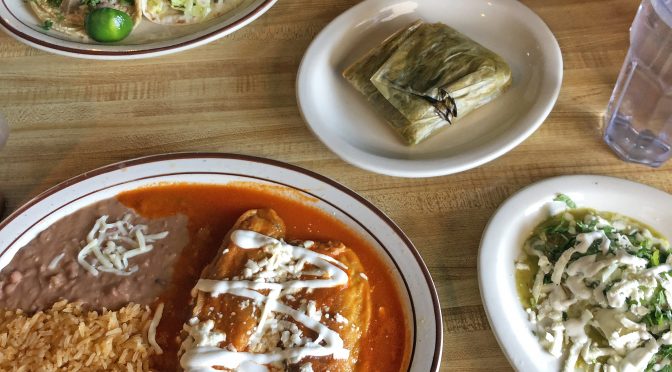 A hearty lunch at La Lupita in Clarksville. where the menu is in Spanish and English: Clockwise from upper left, lengua and asada tacos, a Oaxaca-style tamale, an Oaxacan Tlacoyo, and a chiles rellenos plate.