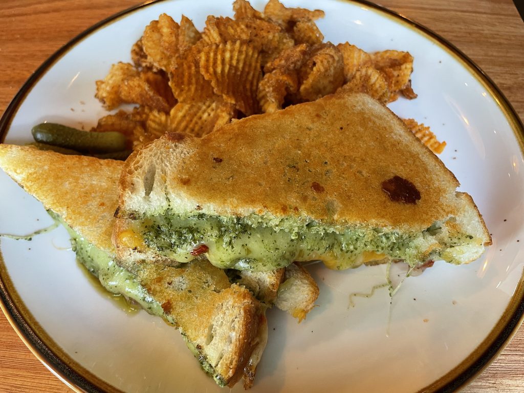 "Toastie" means "grilled cheese" in Australian slang, and this hefty portion on Wiltshire buttermilk bread with aged cheddar, smoked mozzarella and rocket pesto was a treat.