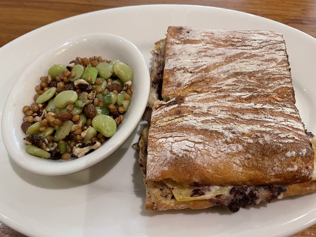 A grilled artichoke and eggplant sandwich built on panini-grilled Pugliese bread makes a hearty and filling lunch.