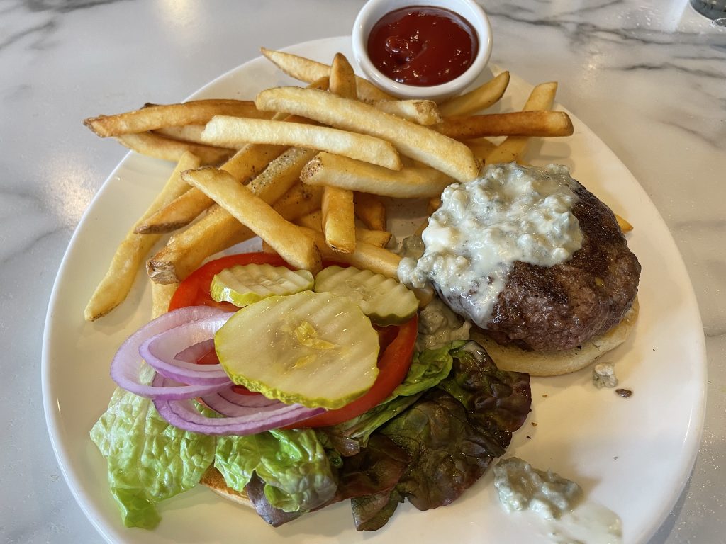 The Uptown burger is a Bardstown Road tradition almost as iconic as, well, green chili wontons. A hefty patty comes fully dressed on an English muffin with abundant fries.