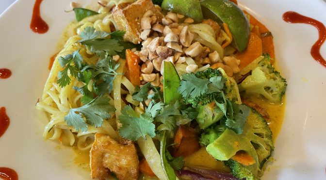 Eat your vegetables and like it: Uptown's gently spicy curried rice noodles are packed with perfectly prepared veggies and tofu.