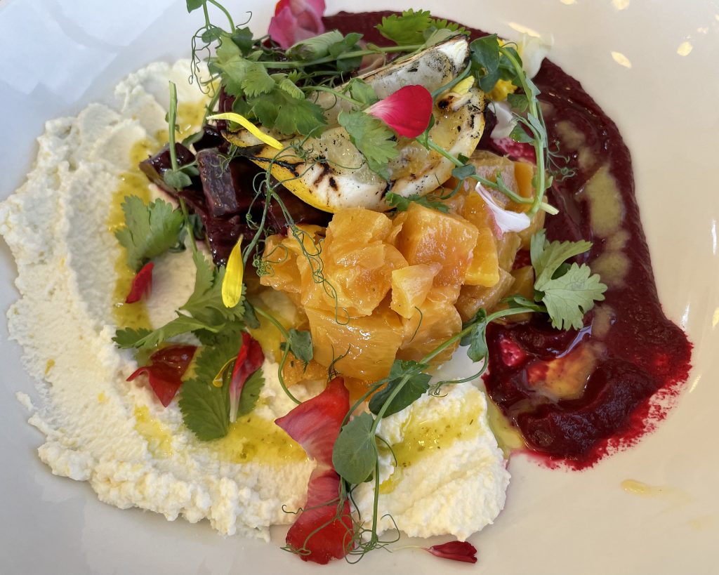 The House of Marigold's salads are hearty enough to make an entree. Ember-roasted, diced red and yellow beets were tasty and attractively presented.