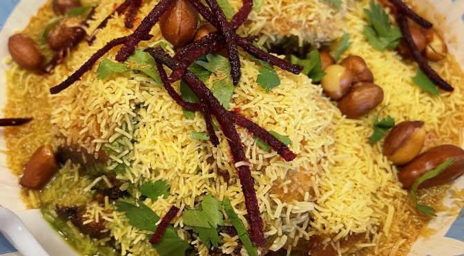 Dabeli chaat was a spicy, fruity, and filling potato snack topped with peanuts and crunchy sev noodles.