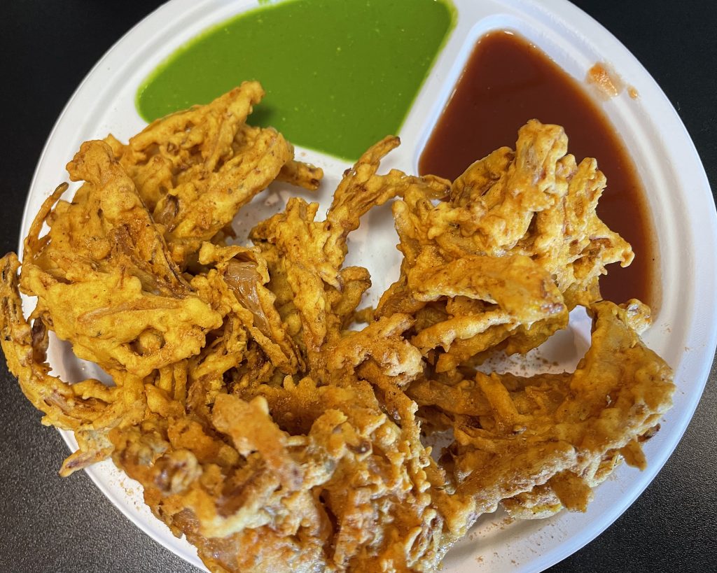 You could call them onion fritters, but pakora take their fritterness to the next level with warming spice and subtle aromatics, plus colorful chutneys for dipping.