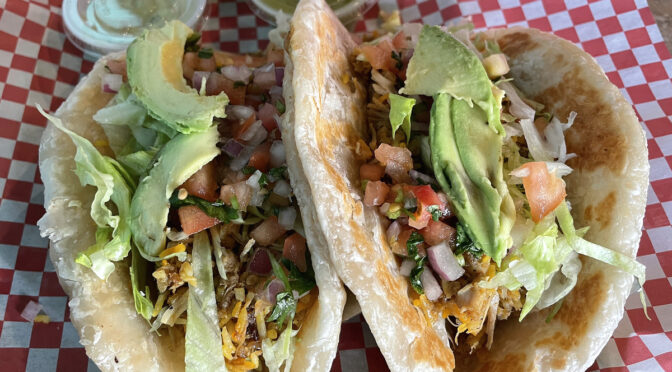 Behold, the Bollywood taco! More Indian than Mexican, it features bites of chicken tikka and avocado loaded into Indian paratha flatbread with taco toppings added.