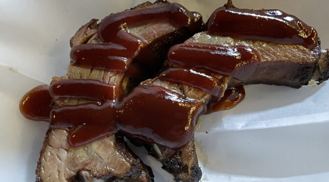 Hot off the smoker, dry-rubbed and cooked to perfection, juicy and firm but not falling off the bone (in other words, overcooked), Four Pegs' smoked baby back ribs are as good as it gets.